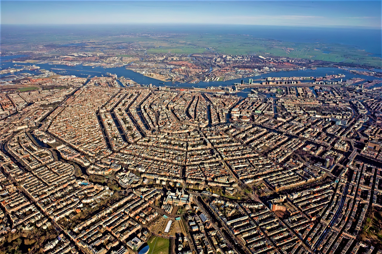 Amsterdam climate-adaptive park with water storage basin visible under plaza